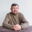 portrait-of-elderly-man-sitting-at-table.jpg